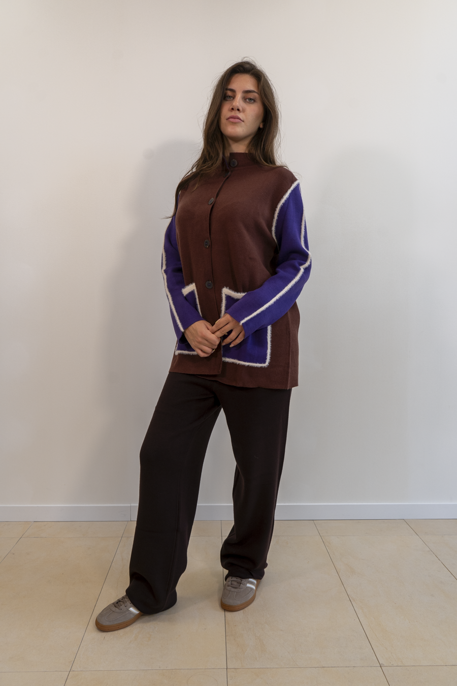 PONCHO CON PROFILI EFFETTO PELUCHE