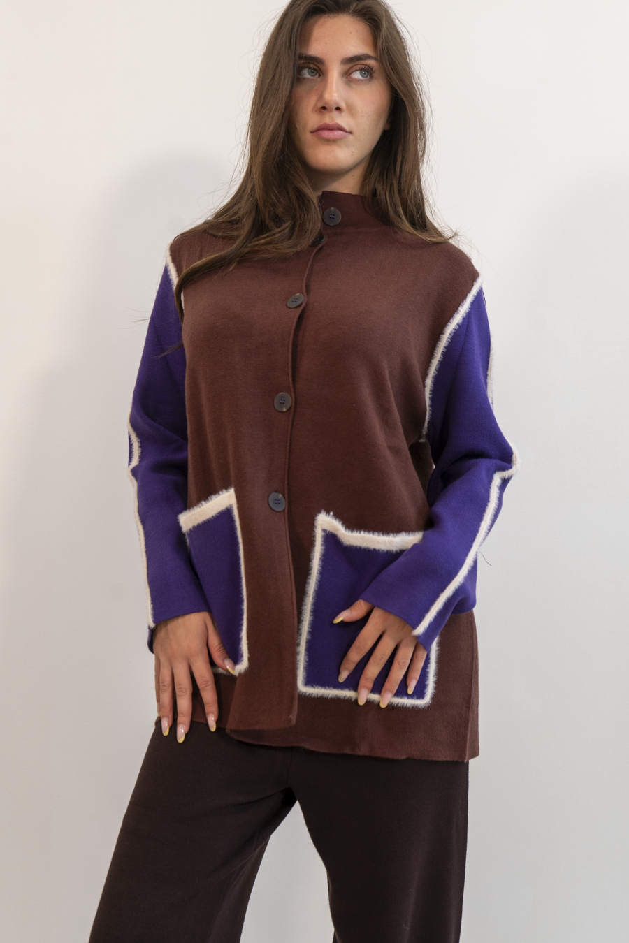 PONCHO CON PROFILI EFFETTO PELUCHE
