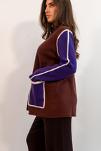 PONCHO CON PROFILI EFFETTO PELUCHE