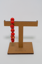 BRACCIALE ELASTICO SFERE CORALLO