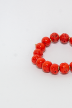 BRACCIALE ELASTICO SFERE CORALLO